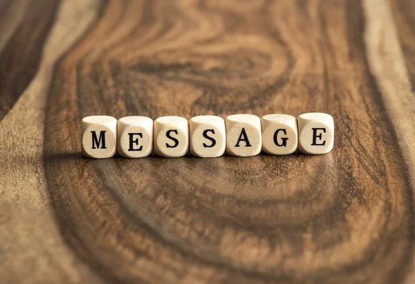 Word MESSAGE on wooden cubes — Stock Photo, Image