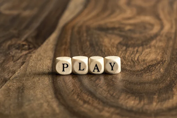 Word PLAY on wooden cubes — Stock Photo, Image