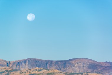 Moon Over Bighorn Mountains clipart