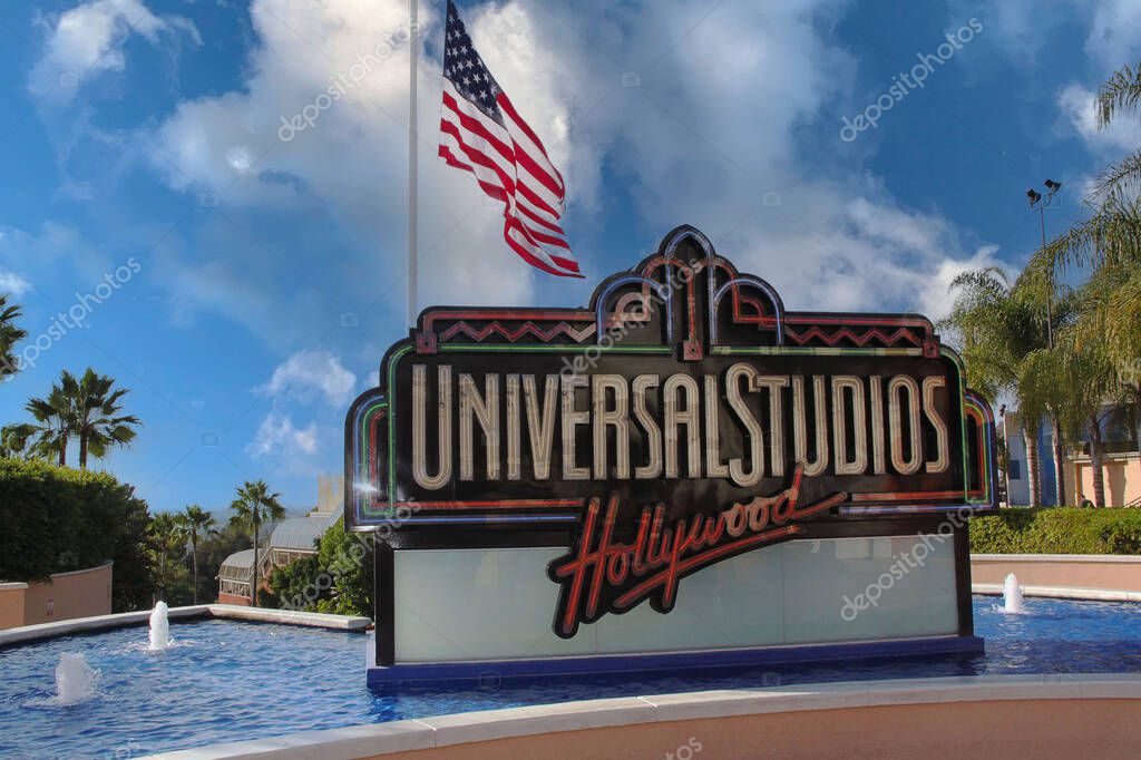 Universal Studios logo surrounded of blue fountain water. Beautiful backgrounds. USA. Los Angeles.