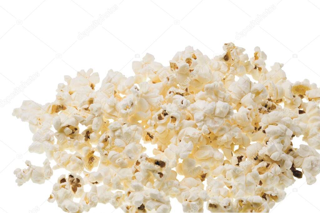 Close up view of popcorn isolated on white background Unhealthy food concept.
