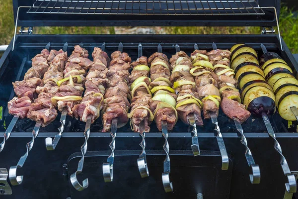 Close op view of barbecue on grill on backyard of private house. Sweden