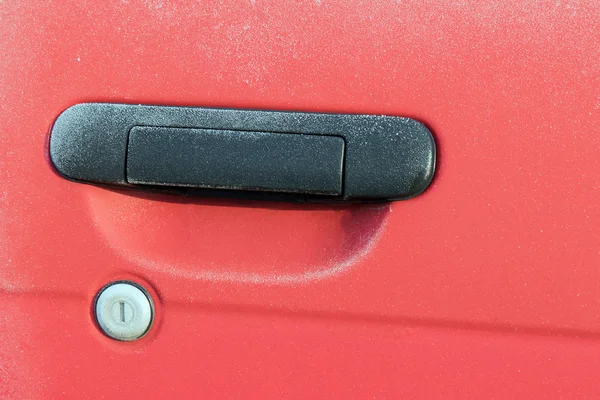 Frozen red car door closeup — Stock Photo, Image