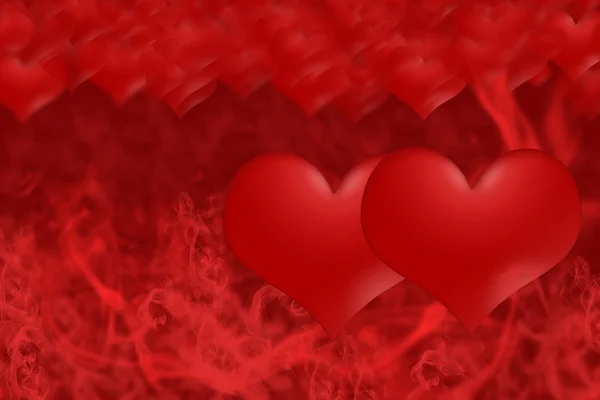 Två hjärtan på en bakgrund av röd rök — Stockfoto