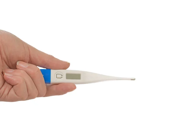 Hand is holding a digital thermometer. Isolated. — Stock Photo, Image