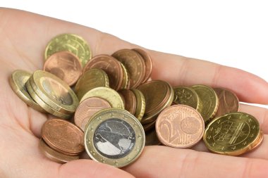 Elini euro coins closeup yığını tutuyor