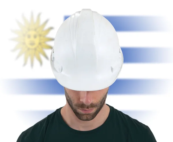 Engineer with flag on background - Uruguay — Stock Photo, Image