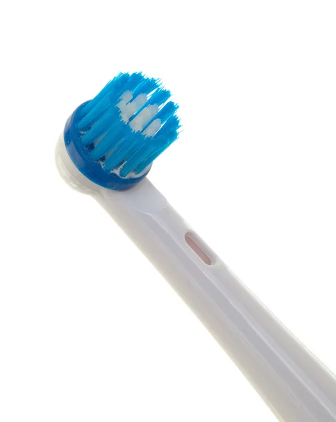 Электрическая зубная щетка — стоковое фото