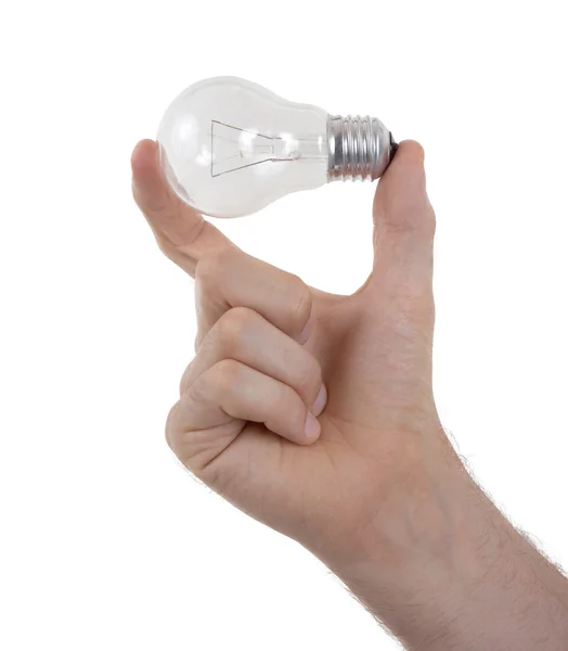 Hand som håller en lampa — Stockfoto