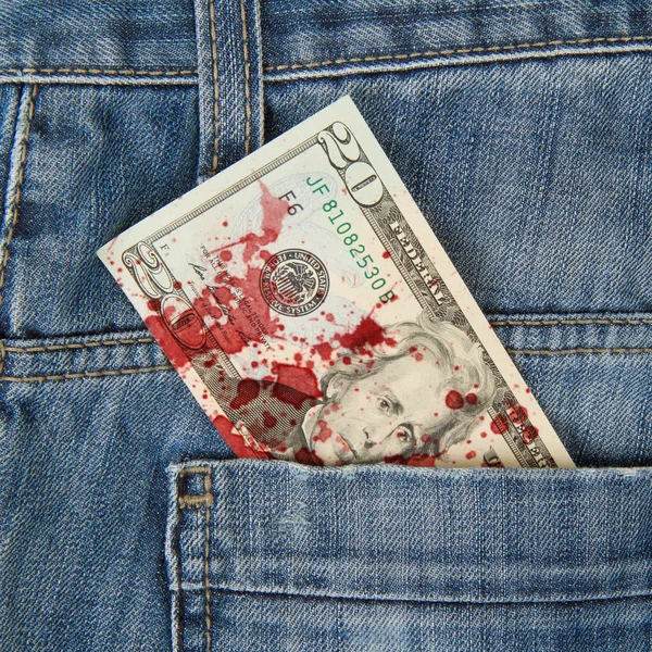 Macro shot of trendy jeans with american 20 dollar bill, blood — Stock Photo, Image