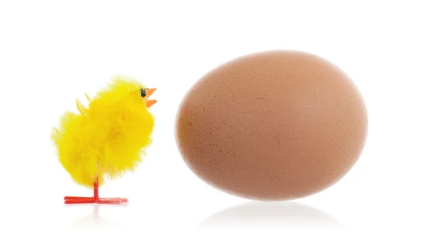 Easter chicks surrounding a large egg — Stock Photo, Image