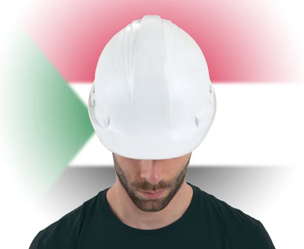 Engineer with flag on background - Sudan — Stock Photo, Image