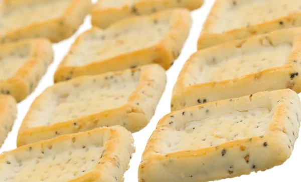 Eenvoudige vierkante crackers geïsoleerd — Stockfoto