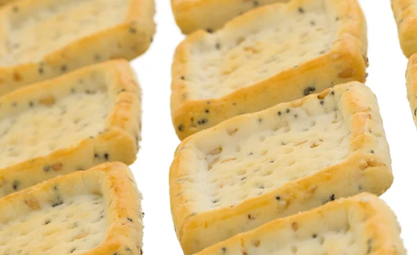 Eenvoudige vierkante crackers geïsoleerd — Stockfoto