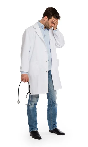 Doutor com um estetoscópio tentando dar más notícias — Fotografia de Stock