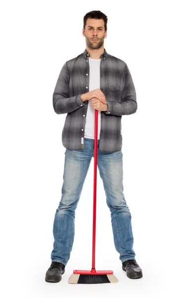 Young worker with a broom — Stock Photo, Image