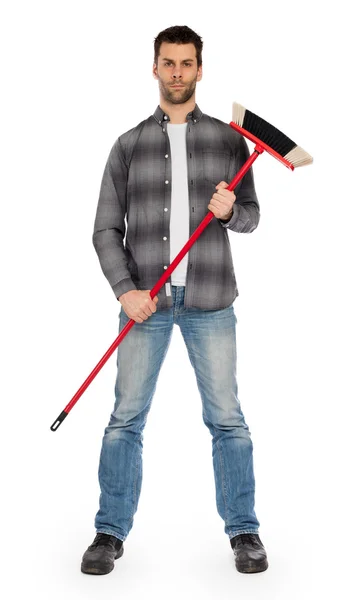 Young worker with a broom — Stock Photo, Image
