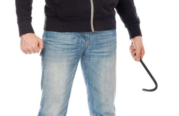 Crime concept. Criminal in hood with crowbar in hand — Stock Photo, Image