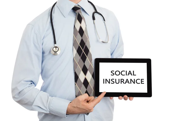 Doctor holding tablet - Social insurance — Stock Photo, Image