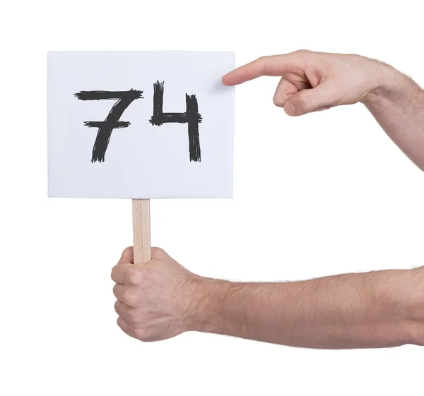 Sign with a number, 74 — Stock Photo, Image