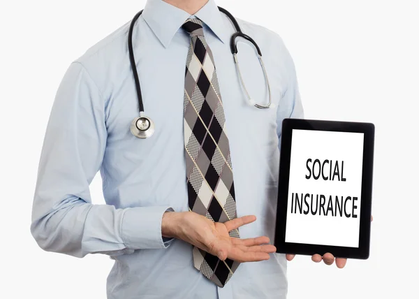 Doctor holding tablet - Social insurance — Stock Photo, Image