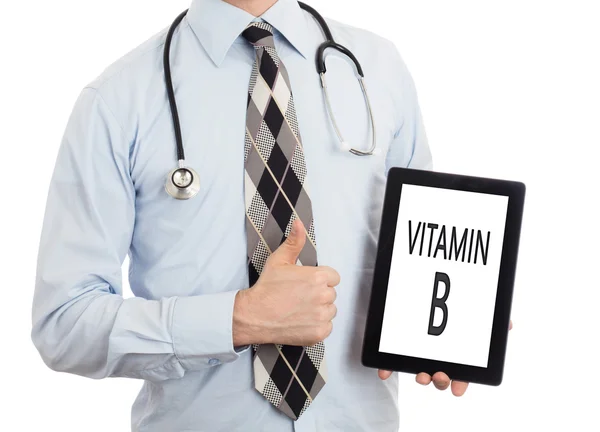 Doctor holding tablet - Vitamin B — Stock Photo, Image