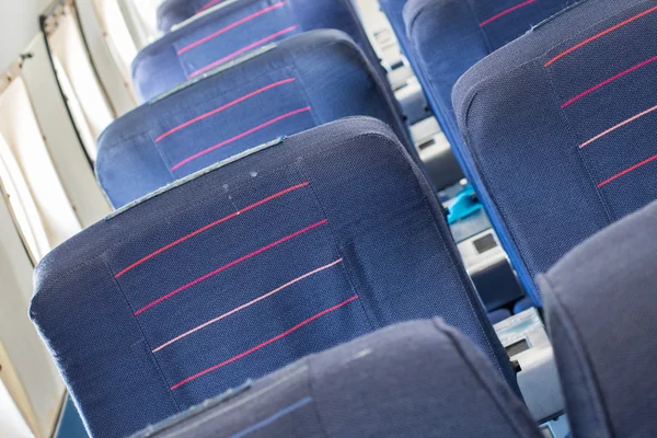 Empty old airplane seats in the cabin, selective focus — Stock Photo, Image