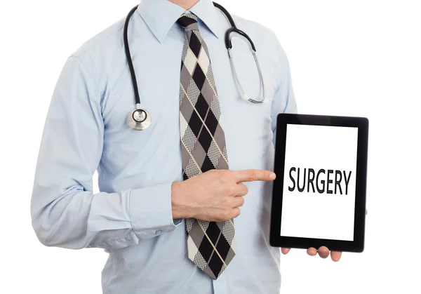 Lekarz trzymając tabletkę - Chirurgia — Zdjęcie stockowe