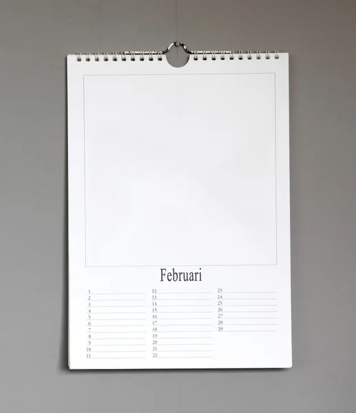 Simple old birthday calendar hanging on a grey wall - Februari — Stock Photo, Image