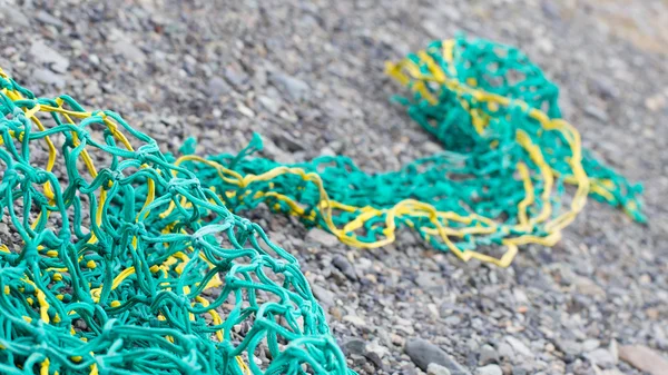 Fisknät på en strand — Stockfoto