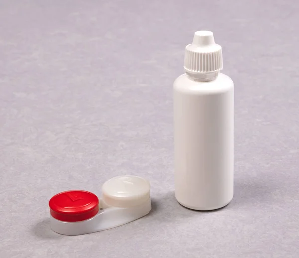 Red Contact Lens Case Bottle Solution Isolated Grey Background — Stock Photo, Image