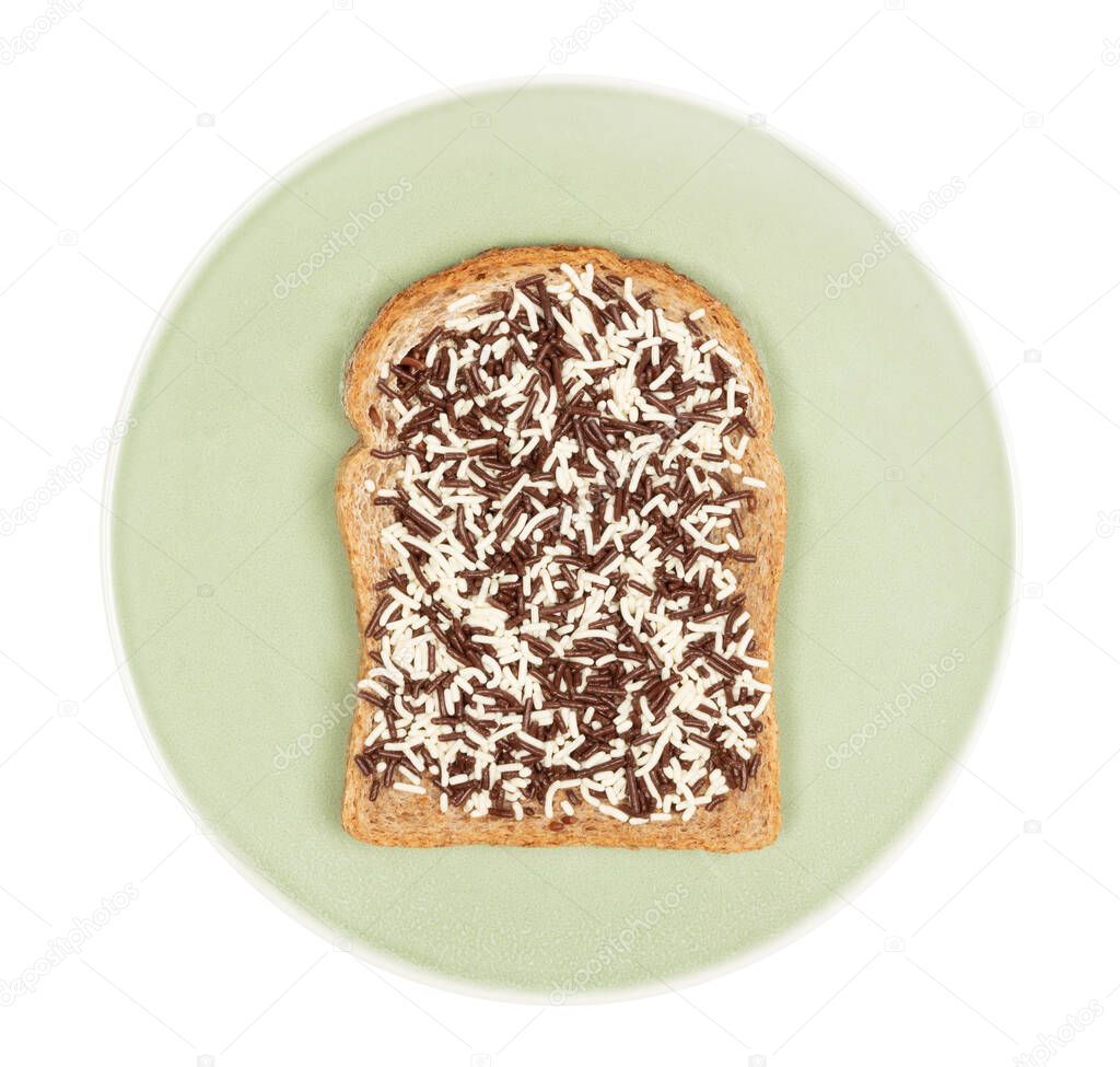 Typical dutch lunch; bread with chocolate sprinkles (hagelslag), isolated