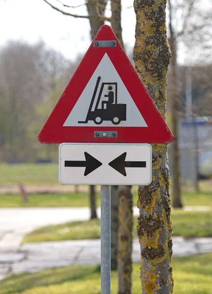 Fork lift trucks warning sign, crossing the road