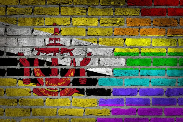 Dunkle Ziegelmauer - lgbt rights - brunei — Stockfoto