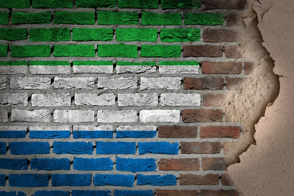 Dark brick wall with plaster - Sierra Leone — Stock Photo, Image