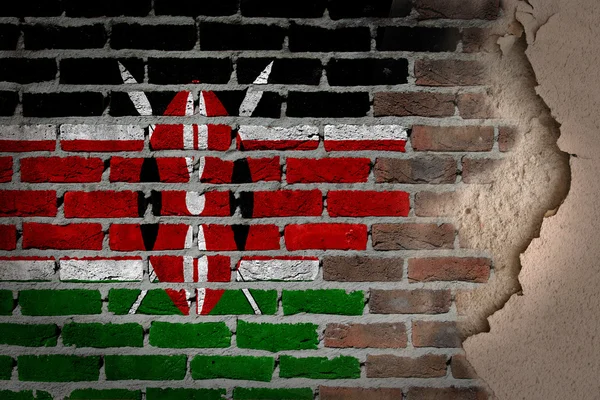 Donkere bakstenen muur met gips - Kenia — Stockfoto