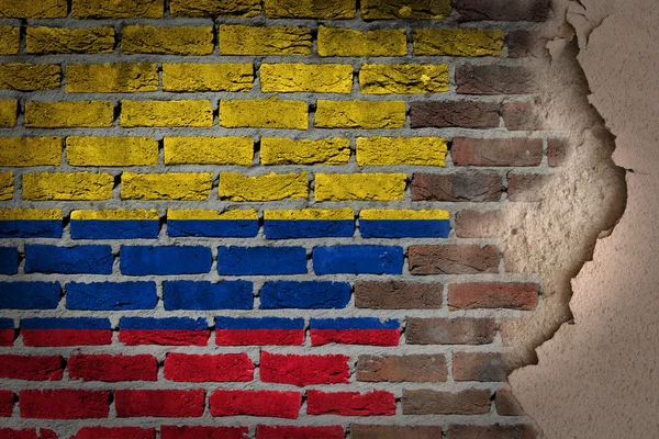 Donkere bakstenen muur met gips - Colombia — Stockfoto