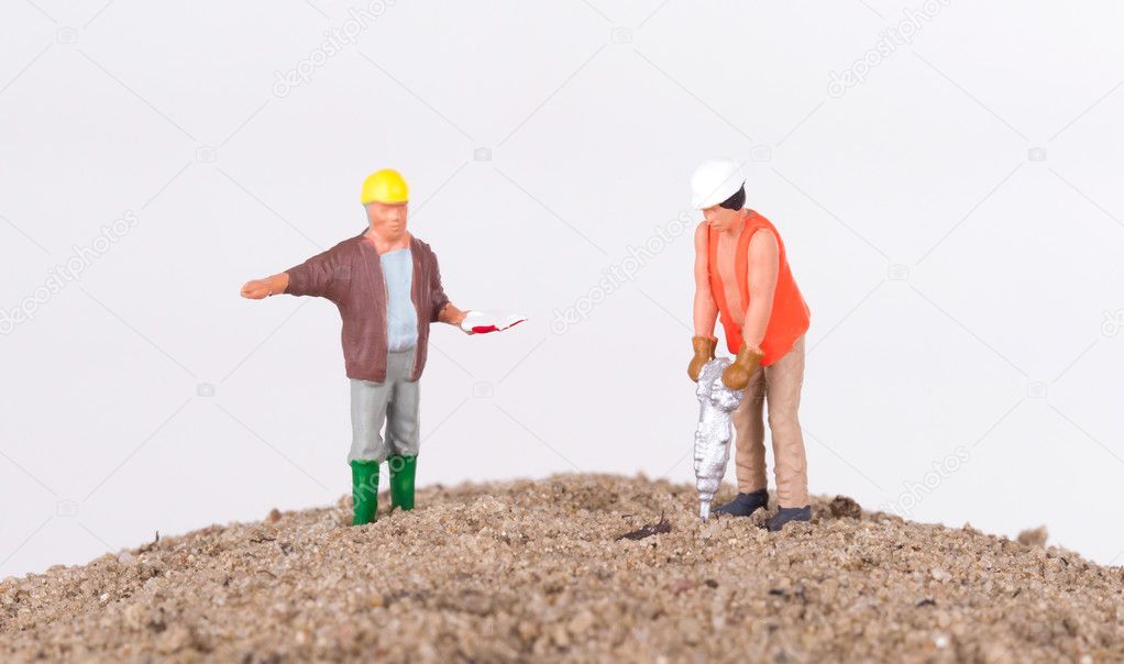 Miniature worker with a power drill