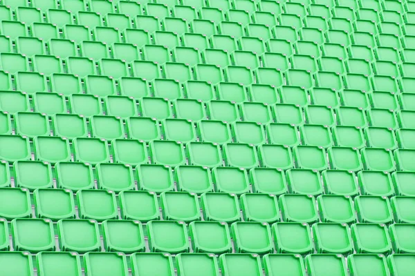 Assento verde no estádio desportivo — Fotografia de Stock