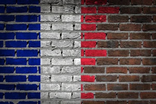 Texture murale en brique avec drapeau — Photo