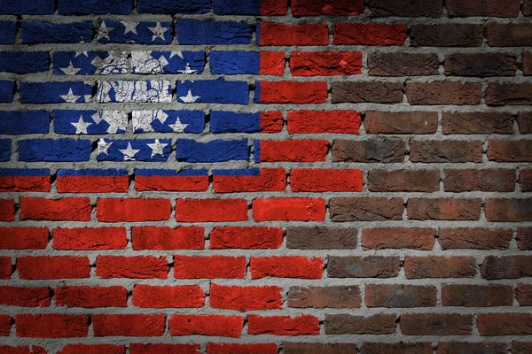 Textura de pared de ladrillo con bandera — Foto de Stock