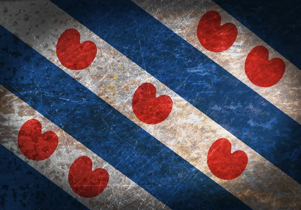 Oude roestige metalen teken met een vlag — Stockfoto