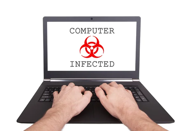 Man working on laptop, computer infected — Stock Photo, Image