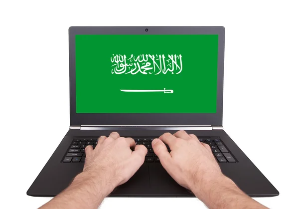 Hands working on laptop, Saudi Arabia — Stock Photo, Image