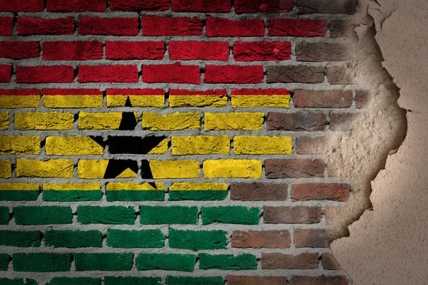 Donkere bakstenen muur met gips - Ghana — Stockfoto