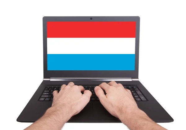 Hands working on laptop, Luxembourg — Stock Photo, Image