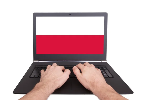 Handen bezig met laptop, Polen — Stockfoto