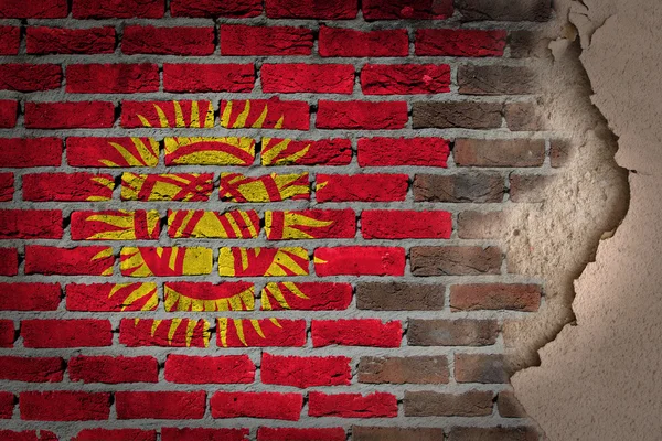 Стена из темного кирпича с гипсом - Кыргызстан — стоковое фото