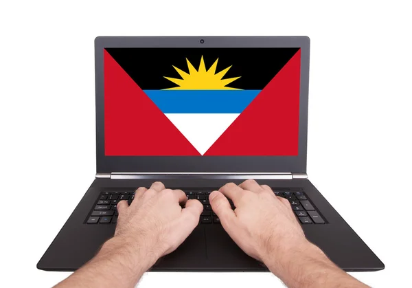 Hands working on laptop, Antigua and Barbuda — Stock Photo, Image