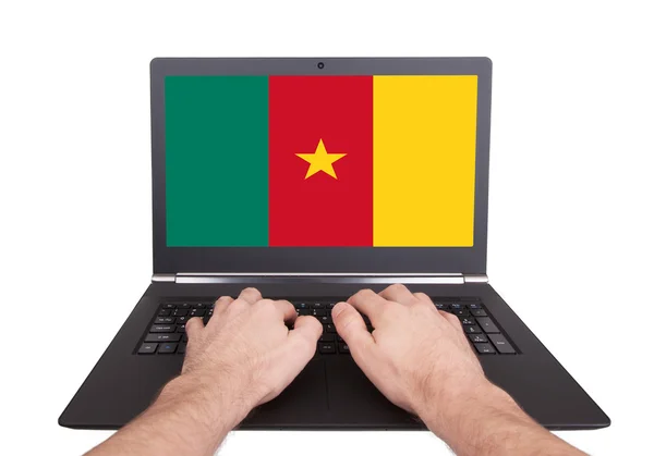 Hands working on laptop, Cameroon — Stock Photo, Image